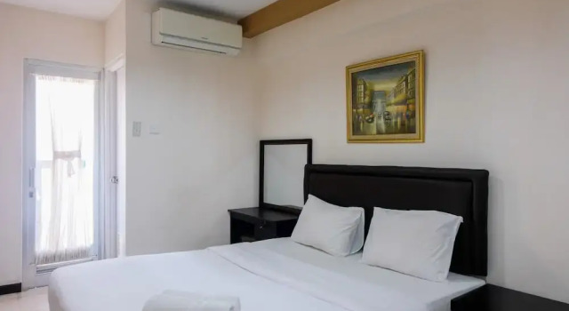 Номер Standard City View Studio @ Green Bay Pluit Apartment
