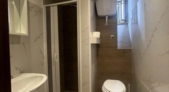 Standard- tredobbelt værelse Freedom Traveller Hostel