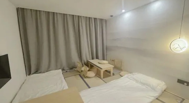 Кровать в общем номере Jiashu Yunshe Hostel