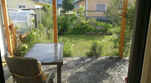 Апартаменты с 2 комнатами Doppelhaushälfte mit Garten