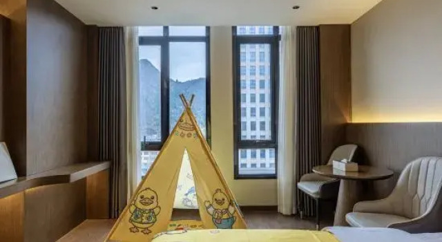 Семейный тент Junyi Hotel (Ziyun New Town)