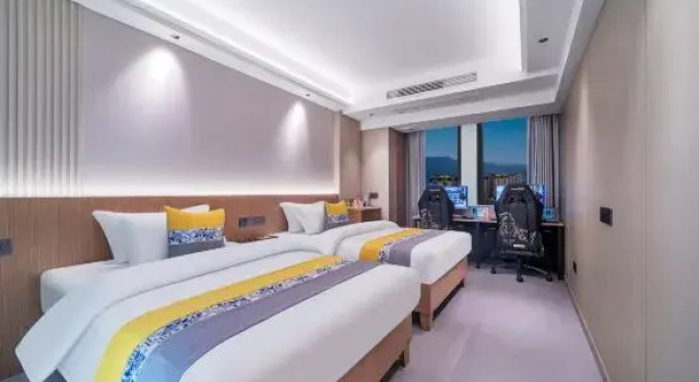Кровать в общем номере Senhai E-sports Hotel
