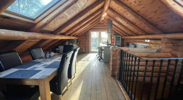 Woodpecker Log Cabin with hot tub, pizza oven bbq entertainment area, lakeside with private fishing peg situated at Tattershall Lakes