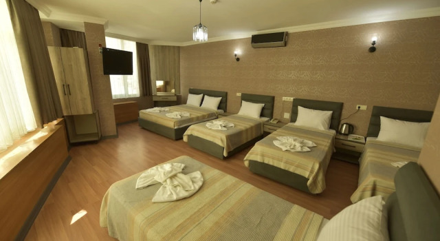 Четырёхместный семейный номер Standard Omega Luxx Hotel