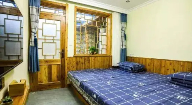 Кровать в общем номере Guanglu Island Yun Yiju Chinese Inn
