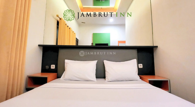Luxo quarto Jambrut Inn