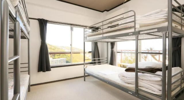 Кровать в общем номере ITO-SPA Guest House YAMATOSO