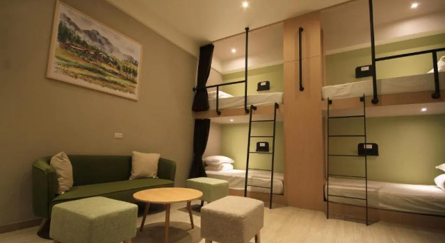 (camerata femminile) letto in camerata Hangkhau Hotel