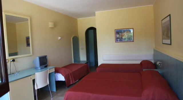 Четырёхместный номер Standard Hotel Villaggio Calaghena