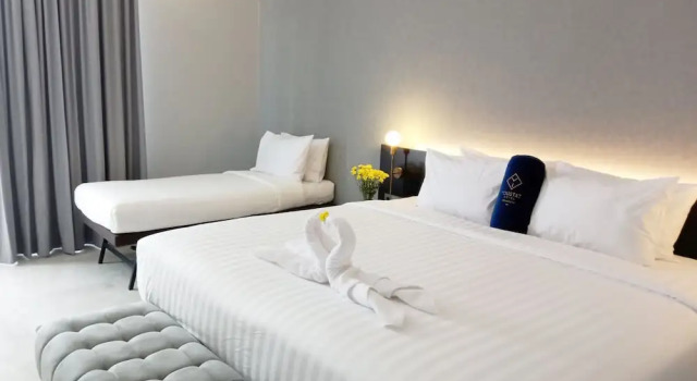 Habitación triple De lujo Hotel Youstay Semarang by Sinergi