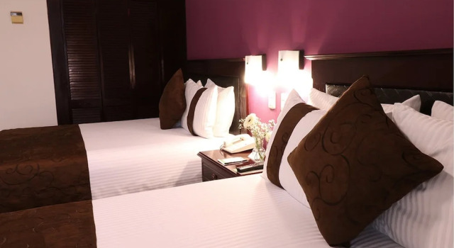 Четырёхместный номер Deluxe Hotel Misión Monterrey Centro Histórico