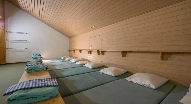 Кровать в общем номере juhui Lenzerheide