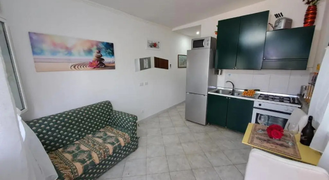 Коттедж Appartamento con giardino