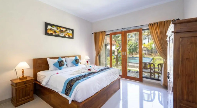 Standard double chambre Vue piscine Surya Maha Bungallo