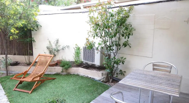 Апартаменты Appartement avec jardin