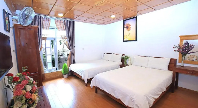 Четырёхместный номер Standard с красивым видом из окна Dan Chi Hotel