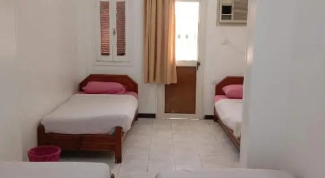 Кровать в общем номере Venus Hotel Luxor 日本人 大歓迎