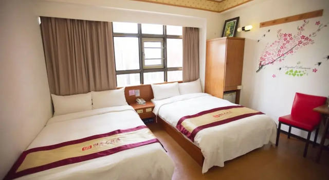 Номер Deluxe LI QING Hotel