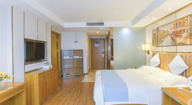 Люкс Wodun Platinum Hotel (Qinzhou East Railway Station Niannianfeng Plaza)