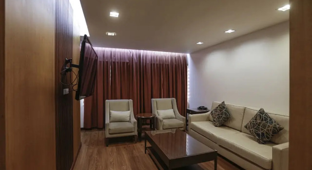 Suite 1 sypialnia Capital O 740 Bliss Hotel Dau
