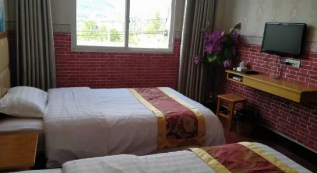 Qianyu Business Hotel (Enshi Railway Station), Prenota Hotel Enshi Prefecture Cina