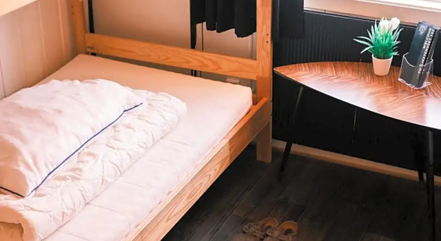 Кровать в общем номере Gjestehuset 102