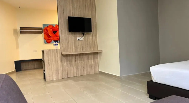 Трёхместный семейный номер Standard SiN LiEN HOTEL