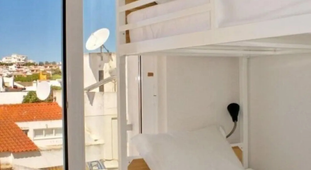 Кровать в общем номере Topcity Hostel & Suites
