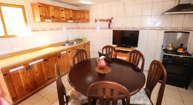 Кровать в общем номере Hostal Sumaj