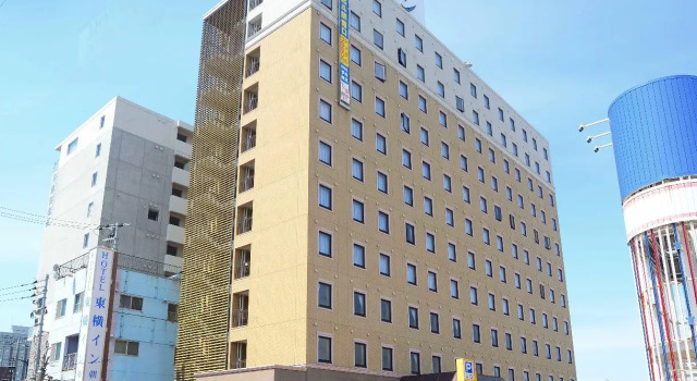Кровать в общем номере Toyoko Inn Hokkaido Hakodate Ekimae Asaichi