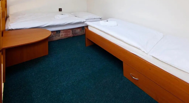 Standardowy czteroosobowy pokój i balkonem Hotel Wolf
