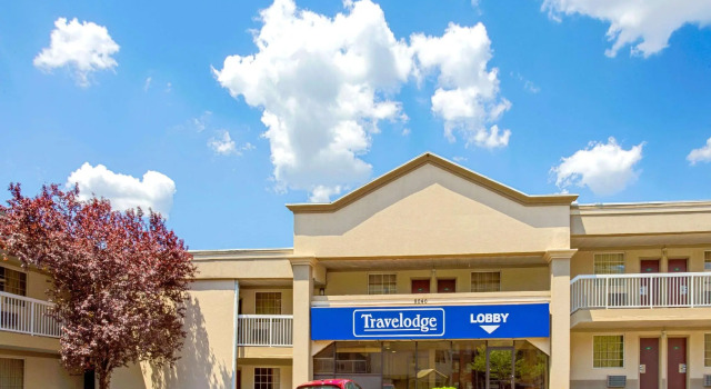 Кровать в общем номере Travelodge by Wyndham Silver Spring