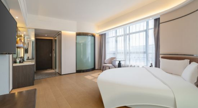 Номер Deluxe Liangde Hotel (Shenzhen Shajing Houting Subway Station)