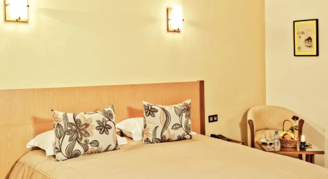 Camera Standard Across Hotels & Spa