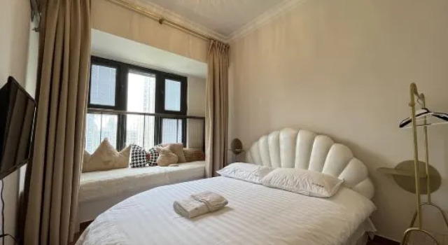 Люкс с 4 комнатами с балконом Qidong Dreams Seaview Theme Boutique Apartment (Hengda Venice Shop)