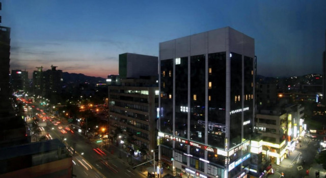 Кровать в общем номере KSTAR METRO Hotel