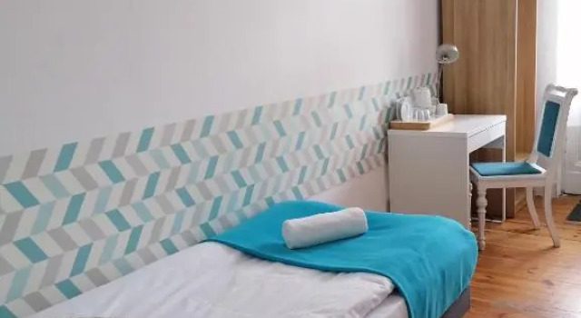 Номер Deluxe Blooms Inn & Apartments