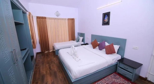 Трёхместный номер Executive Delightz Inn