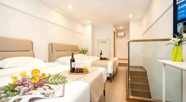 Люкс Hailan Movie Apartment (Tianhe Airport Aviation Headquarters Subway Station)