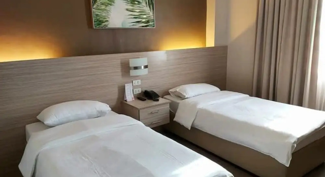 Standardowy pokój Palau Hotel
