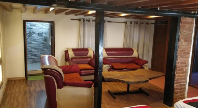 Кровать в общем номере Tulaja Boutique Hotel