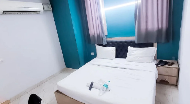 Roomshala 150 Happy Inn Vinod nagar, Забронировать Отель Patparganj Нью-Дели, рядом с Lal Bahadur Shastri Hospital