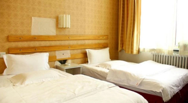 Tianli Inn, Rezerwuj Hotel Hotele w Hondlon z parkingiem, Parking