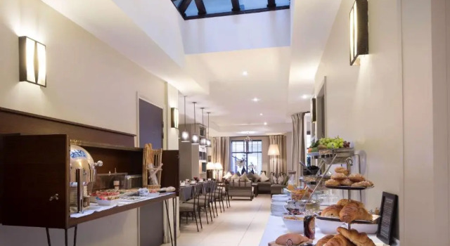 Номер Deluxe Hôtel Paris Louvre Opéra