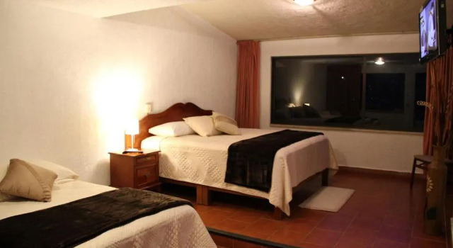 Четырёхместный номер Standard с красивым видом из окна Hotel Quinta del Sol