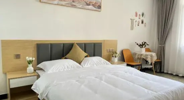 Четырёхместный семейный люкс с 2 комнатами Jiuzhaigou Mountain Yeli Holiday Homestay