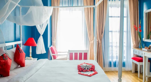 Номер Deluxe The Frangipani Royal Palace Hotel