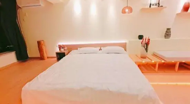 Кровать в общем номере Huatianli · Net Red Cave Theme Viewing B&B (Yanji Yanbian University West Market Branch)