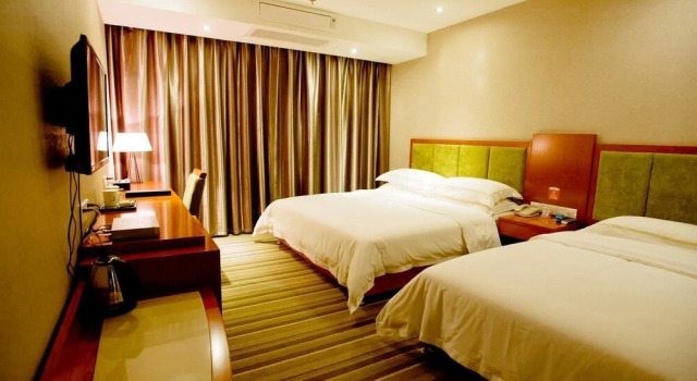 Wuyue Scenic Area Hotel Xishuangbanna, Buchen Sie Hotel Hotels in Yunnan mit Parkplatz, Parkplätze