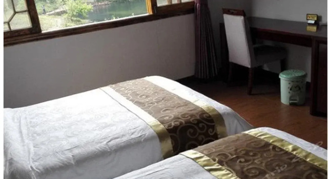 Luzhou Xinhua Inn, Rezerwuj Hotel Luzhou Sichuan